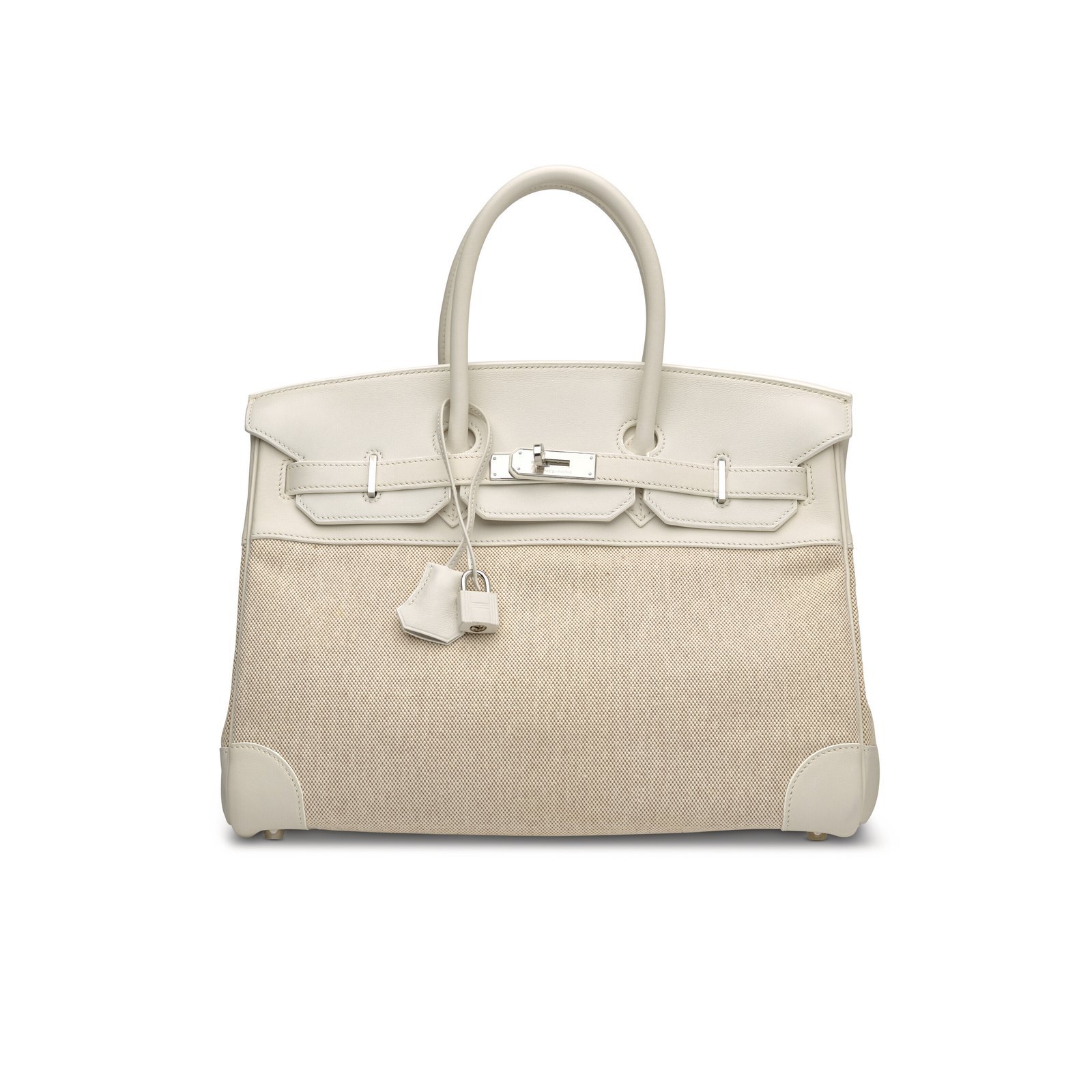 Front view of a cream leather and beige canvas Birkin-style handbag with silver-tone hardware.